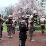 A-MAZE-ING Laughter by Yue Minjun in English Bay