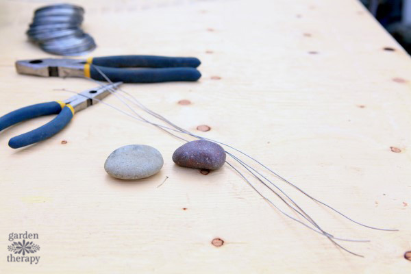 Making rock spiders for a fall garden display