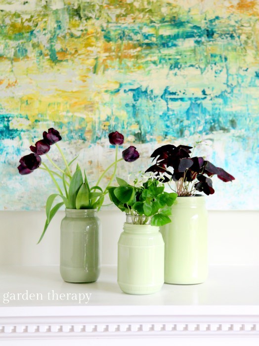 Gorgeous flower arrangement with a mix of cut flowers and potted plants #oxalis #tulips #spring