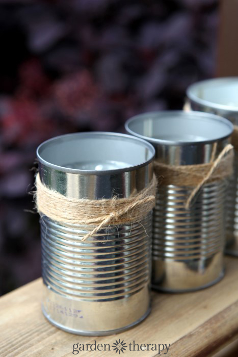 DIY citronella candles in upcycled soup cans 