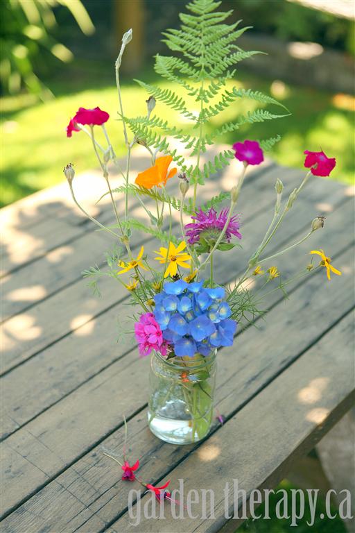 Collecting garden flowers for flower pounding