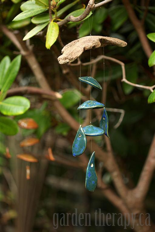 Peacock blue and bamboo clay wind chimes