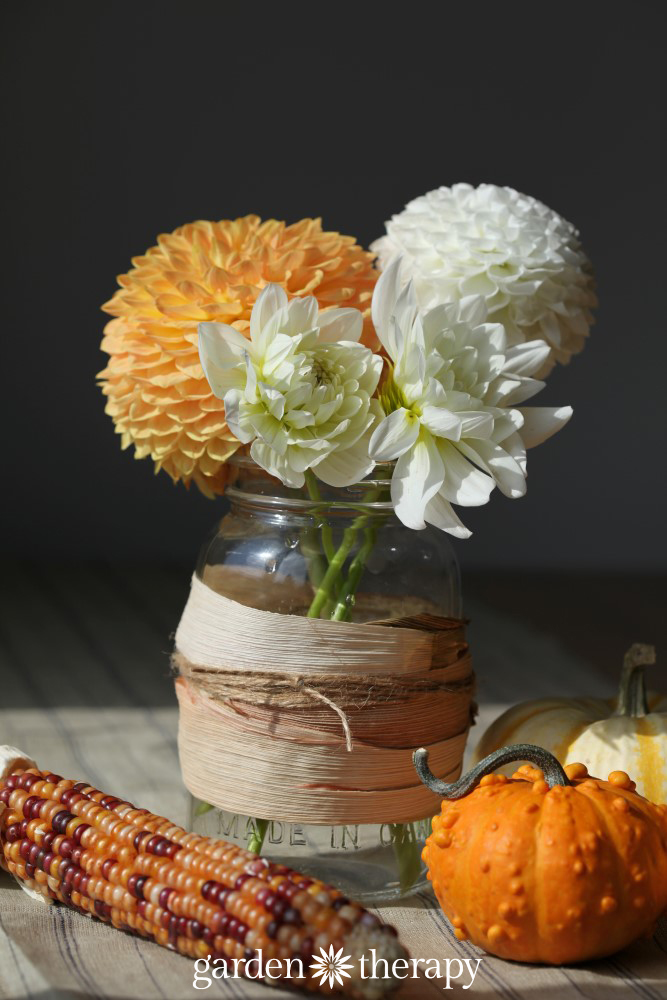 Corn husk wrapped mason jar vase