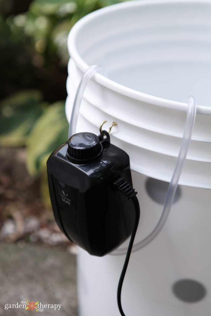 close up of aquarium air pump for compost tea brewer