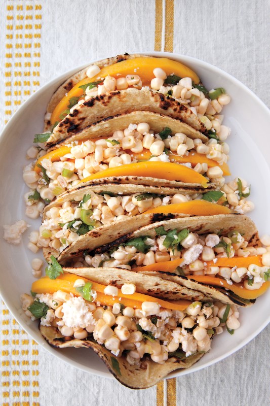 Cotija and Corn Tacos with Lime and Mango photography by Katherine Wolkoff. Courtesy of Martha Stewart Living © 2013 (Custom)