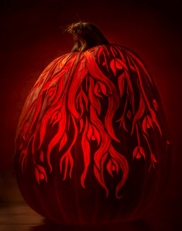 etched pumpkin carving design - falling foliage