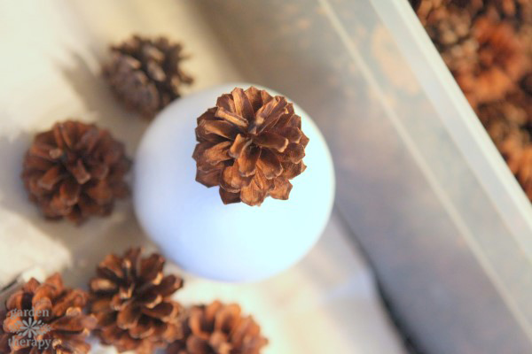 Make These Easy Pinecone Spheres - an easy nature project for festive holiday decor