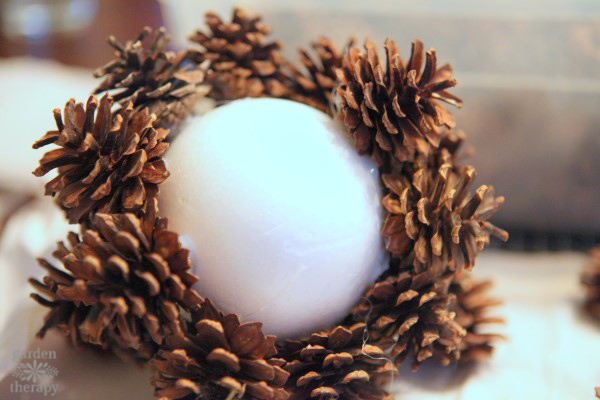 Make These Easy Pinecone Spheres - an easy nature project for festive holiday decor