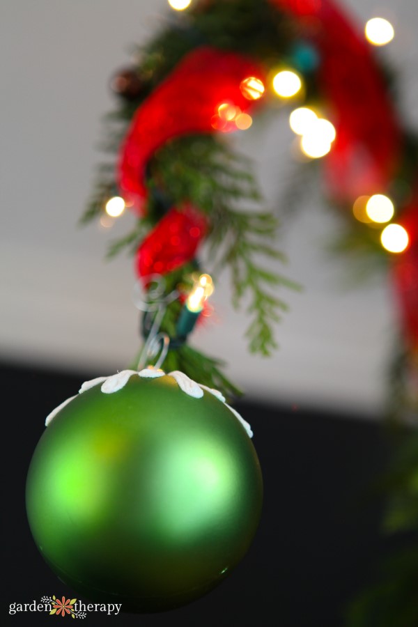 close up of a green ornament on a Whoville Christmas tree