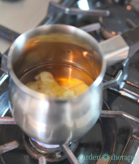 Healing cuticle balm recipe being made on a stovetop