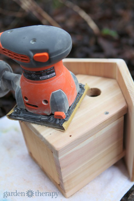 sanding the bird house from how to make a metalwork birdhouse