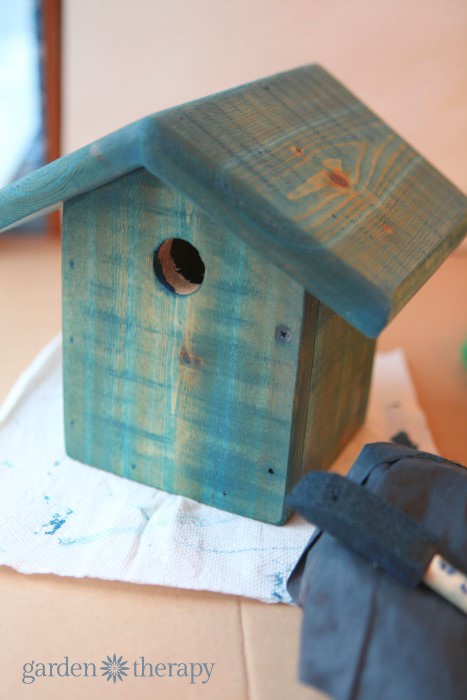 staining the bird house from how to make a junk metalwork birdhouse