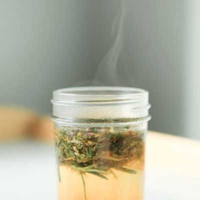 Herbal tea infusion in a mason jar