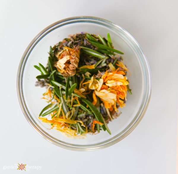 herbal blend of rosemary calendula lavender in a bowl