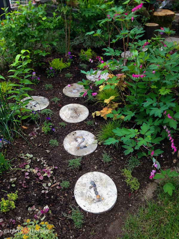 Numbered stepping stones making a garden path