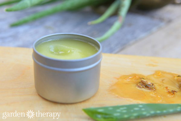 after sun salve with aloe in a tin jar