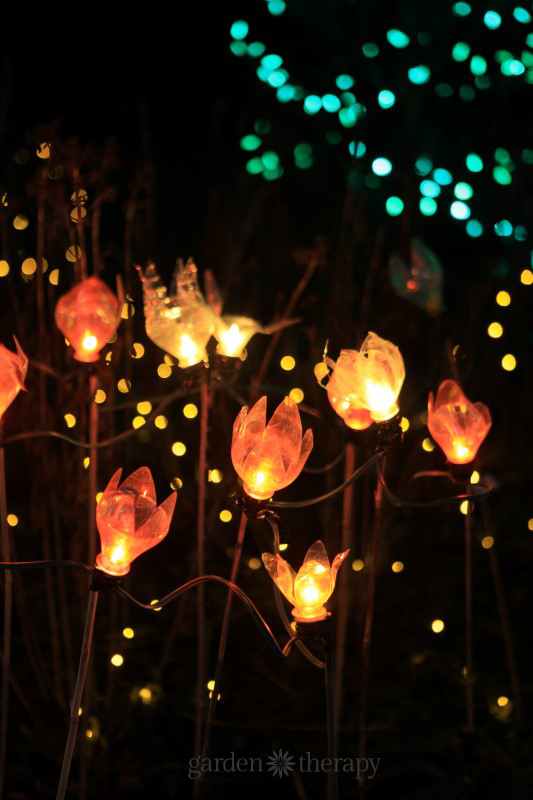 tulip shaped lights in a garden