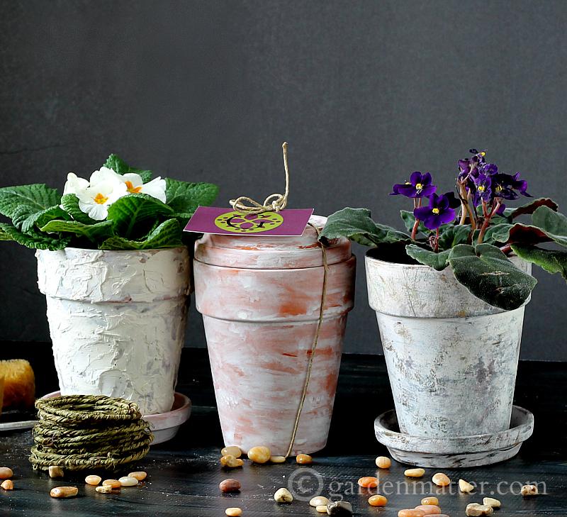 Faux aged pots from 32 terracotta pot hacks