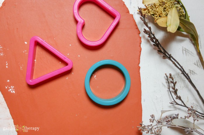 cookie cutters on clay
