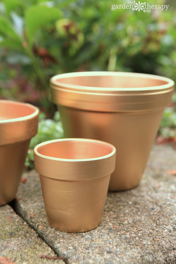 Gold painted terracotta pots AFTER Photo