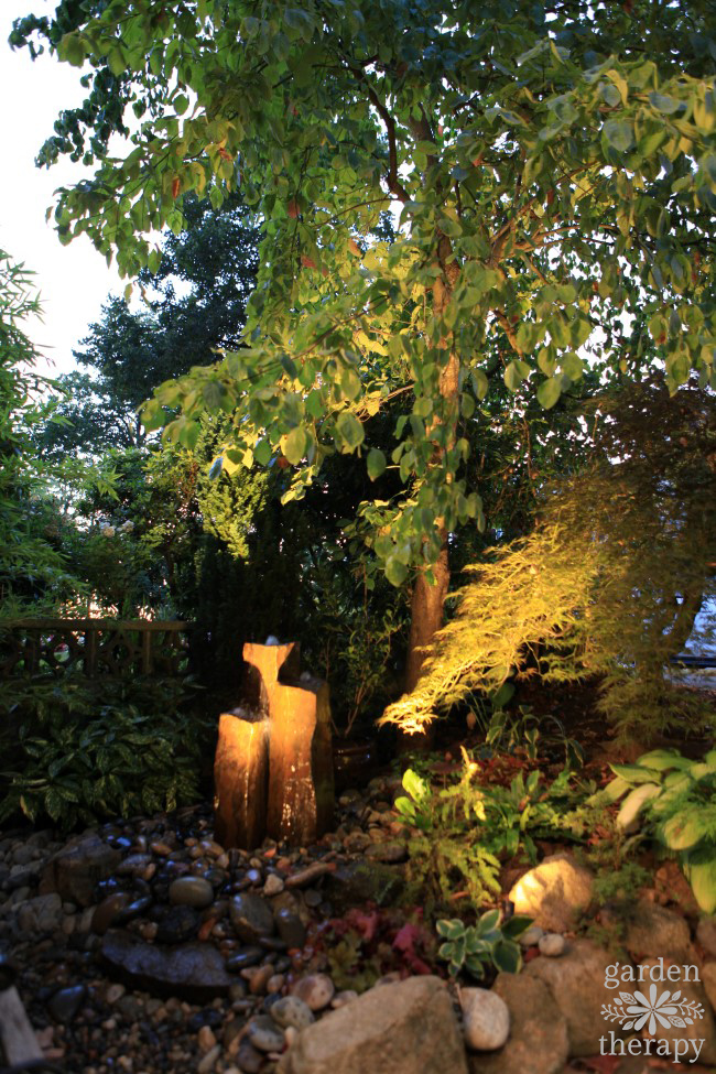 light fountain in dopamine garden at night