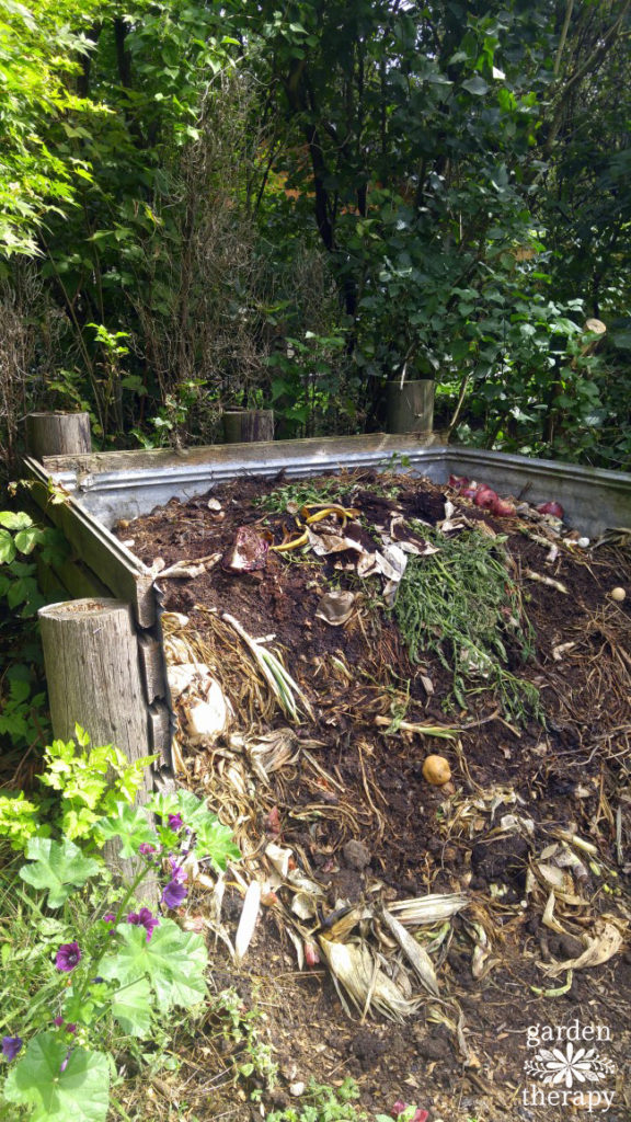Compost bin filled with homemade compost