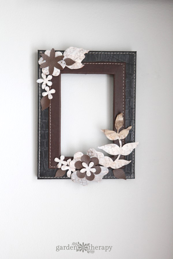 Take some inspiration from the outdoors by making a leather and birch bark picture frame that can be used in so many different ways around the house: to display photos, hang on wall as a wreath, or as a dry erase board.