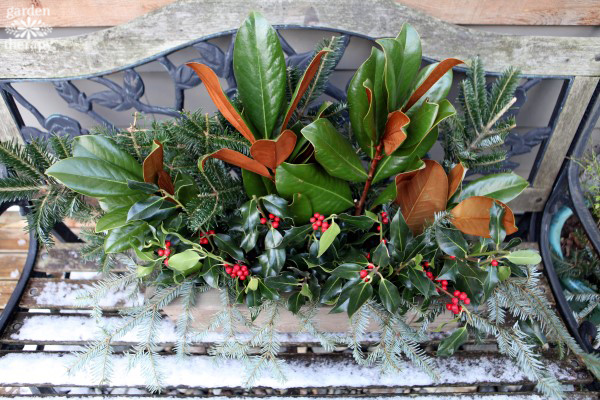 Create a festive holiday window box with a wood planter and some fresh greenery. You will quickly have a long lasting planter to freshen up the outdoors.