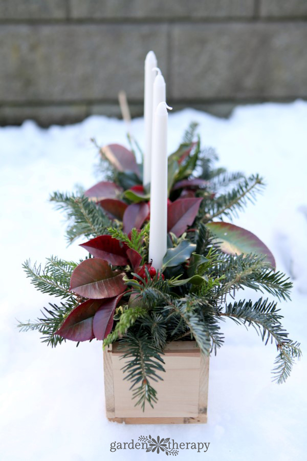 side view of a beautiful rustic Christmas candle centerpiece 
