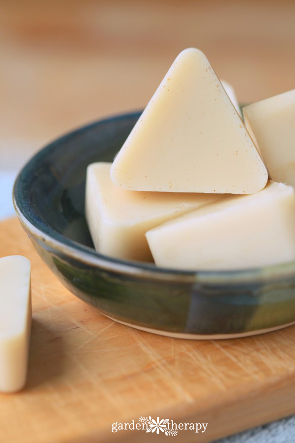 Closeup of triangular, vanilla white lotion bars