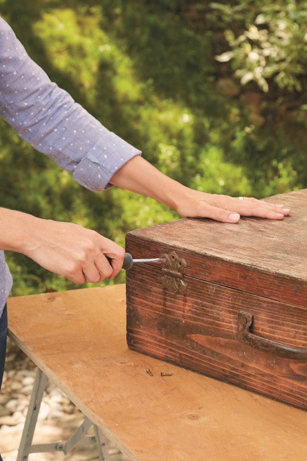 Prep a vintage suitcase to upcycle into a planter