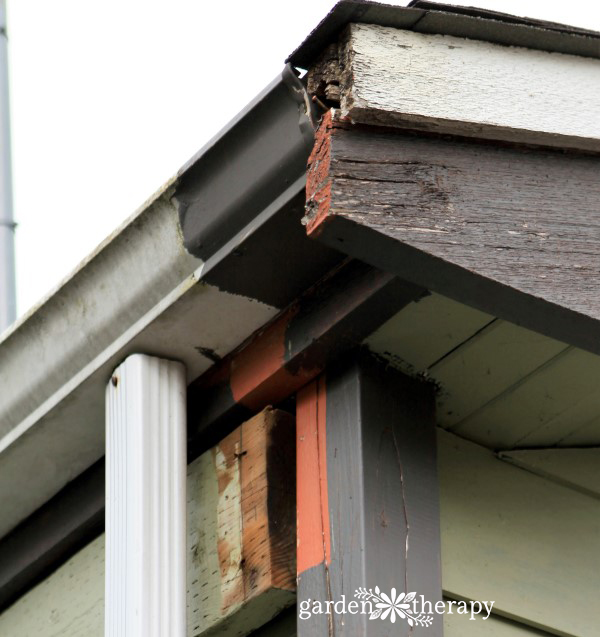 Before Garage Makeover - cracks and rot