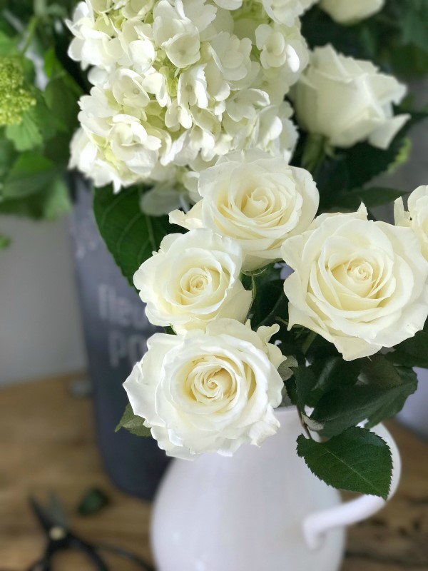 Arrangement with white roses