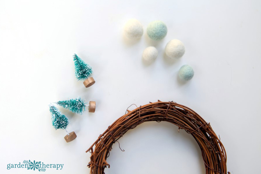 Make a whimsical winterscape on a wreath in a few simple steps.