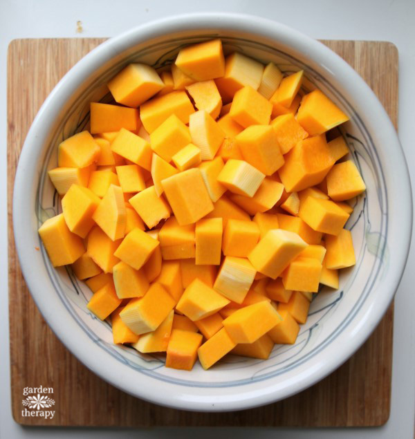 Cut butternut squash into small cubes to roast it