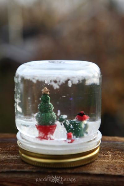 Make a mini garden snow globe.