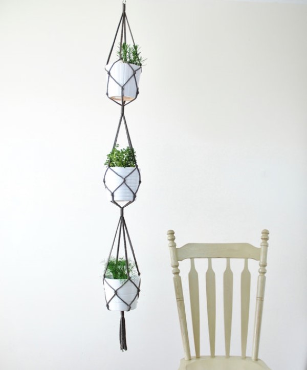 This macrame vertical plant hanger looks great and saves space