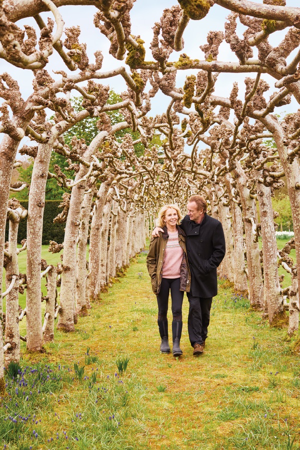 Sting and Trudie in their tree-lined walkway