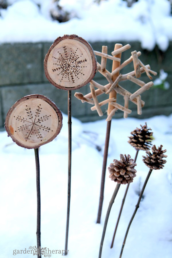 holiday planter ornaments in the snow