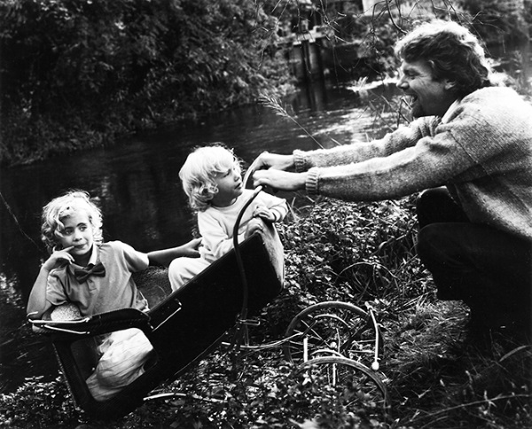 Sir Sichard Branson and children exploring the garden