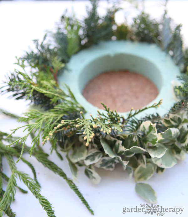 Make this simple DIY Christmas candle wreath for a stunning holiday centerpiece