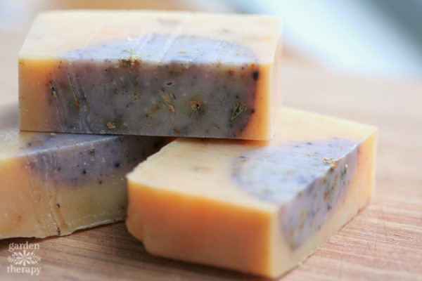 cold process soap with botanicals and essential oils added in