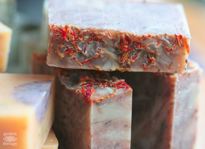 Bar of homemade soap topped with saffron 