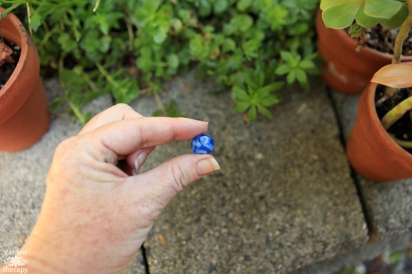 Choose a pretty vintage bead like this blue swirled one