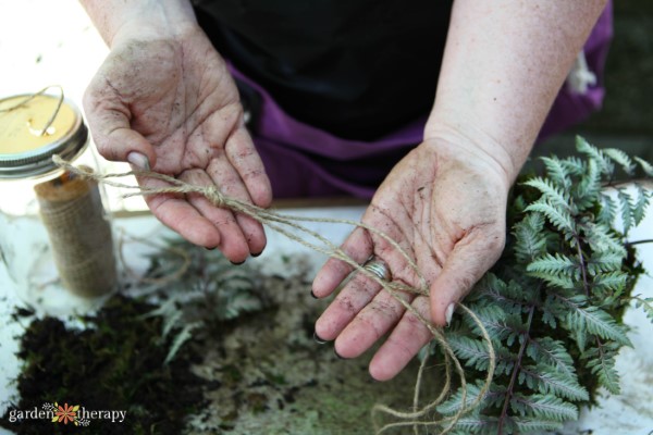 wrap twine to hold the moss ball together