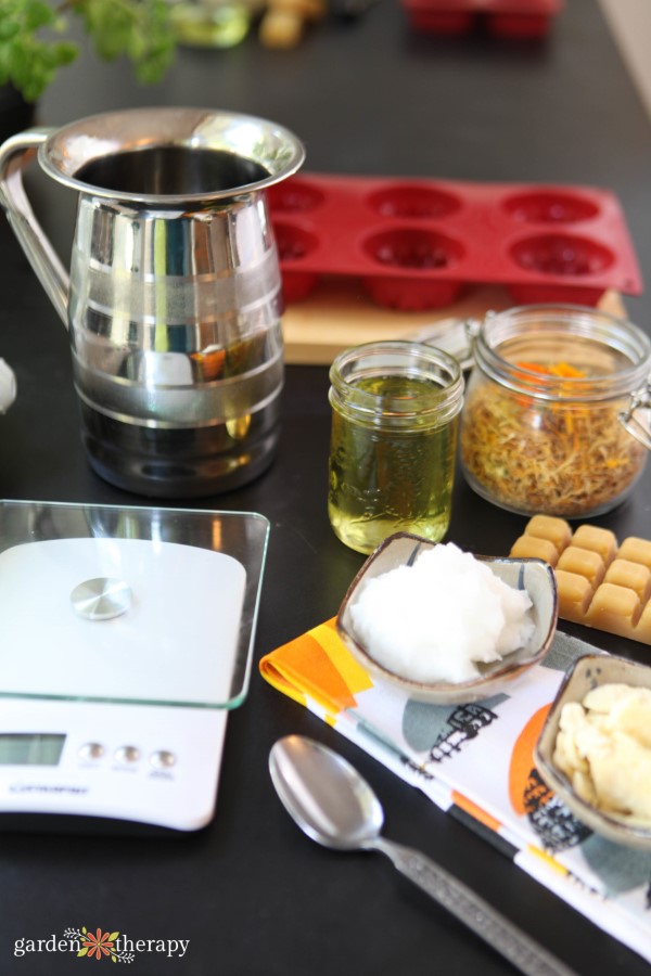 ingredients and materials for making calendula lotion bars