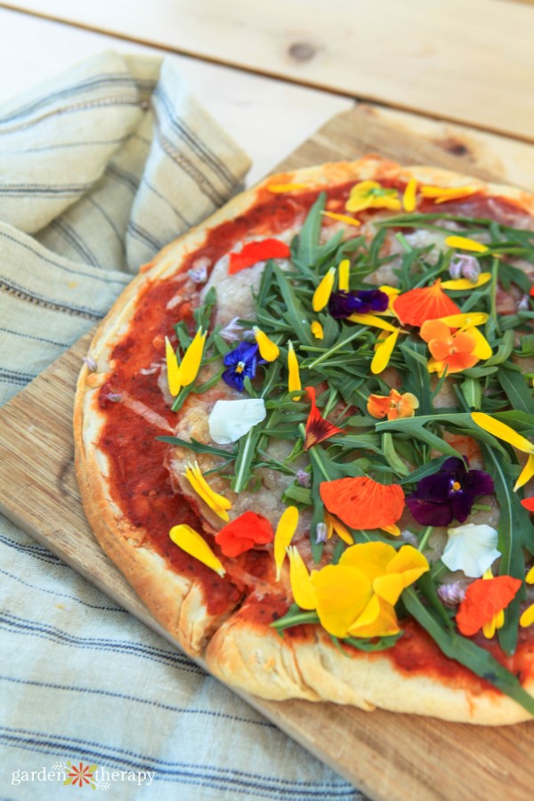 edible flower petals on pizza