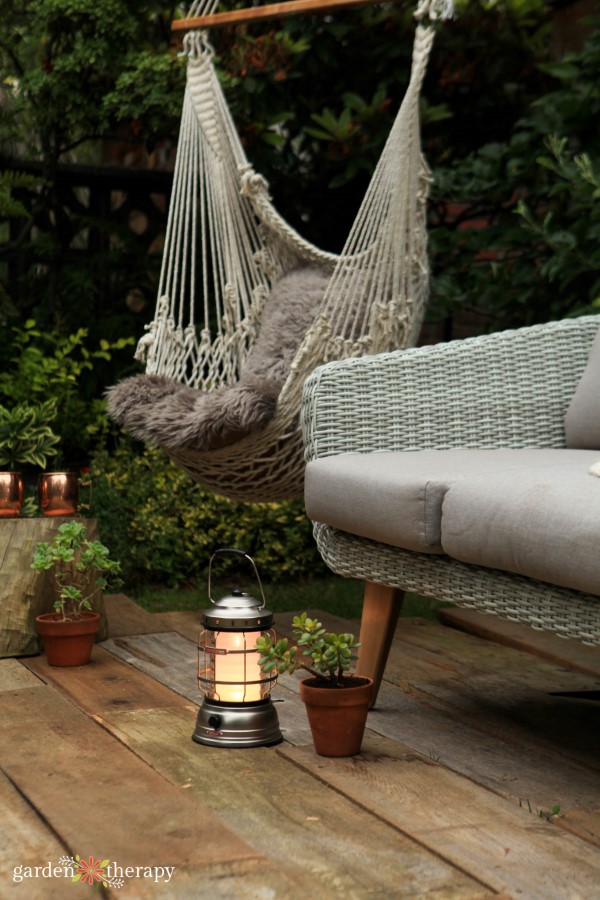 lantern and furniture in an outdoor living room