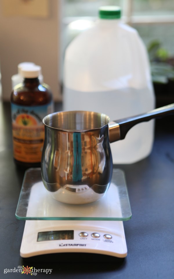 weighing ingredients in a Turkish coffee pot