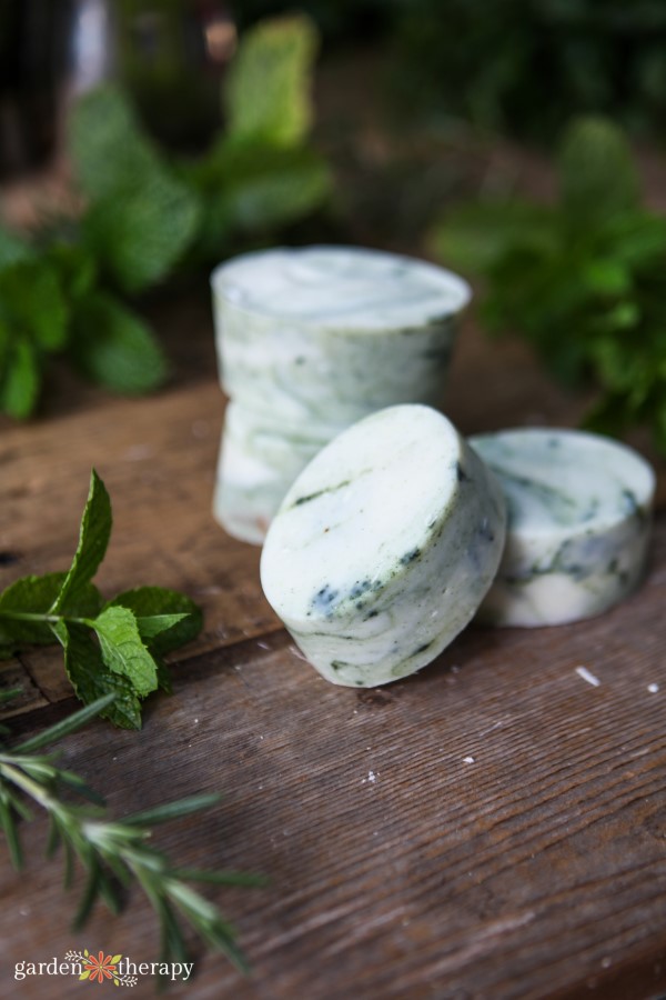 A stack of homemade rosemary spearmint soap bars